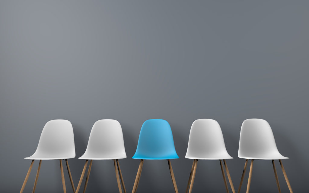 Row of chairs with one odd one out. Job opportunity. Business leadership. recruitment concept. 3D rendering - KarriereRegion Bayreuth - KarriereRegion Bayreuth